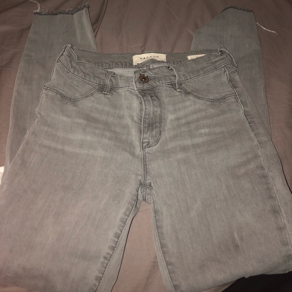 Grey ripped jeans